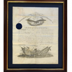 Appointment letter signed by Abraham Lincoln. Elegant framing for this original vellum document. The frame is a typical colonial shape with a 23k gold lip and mahogany stain. The vellum was hinged to museum board and they adhered to a blue satin backing with deep spacers to keep it recessed from the museum acrylic.